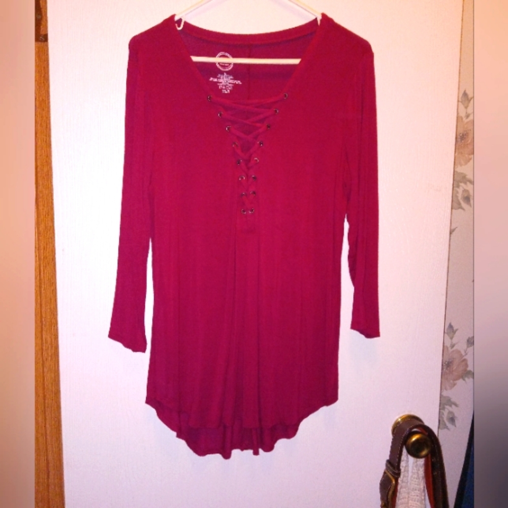 Cranberry tunic with criss cross pattern in front